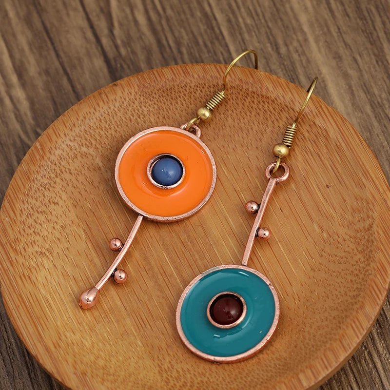 Natural Soul® - Bronze ear with round pendant in ethnic style - NaturJewels®